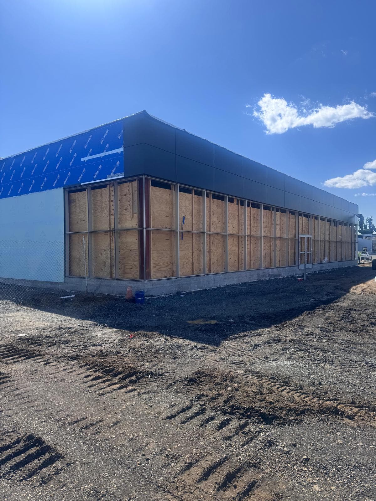 Corner curtain wall framing prepared at the Kia dealership in Keyport.