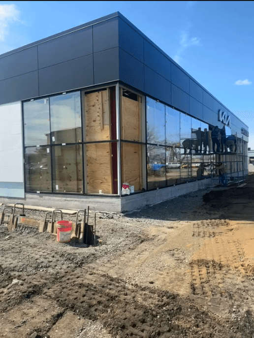 Glazed corner of the Kia curtain wall during installation in Keyport.