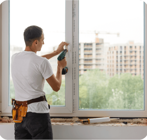 SNJ worker, installing a window in Newark NJ