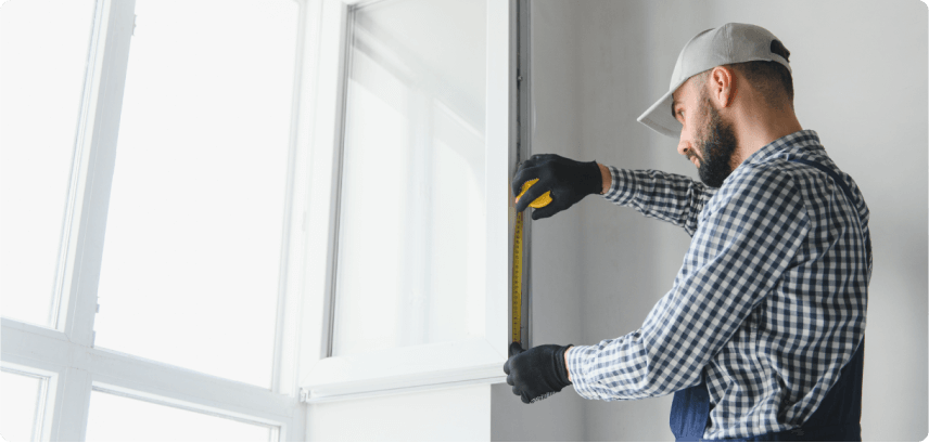 SNJ Worker measuring a window in Newark NJ