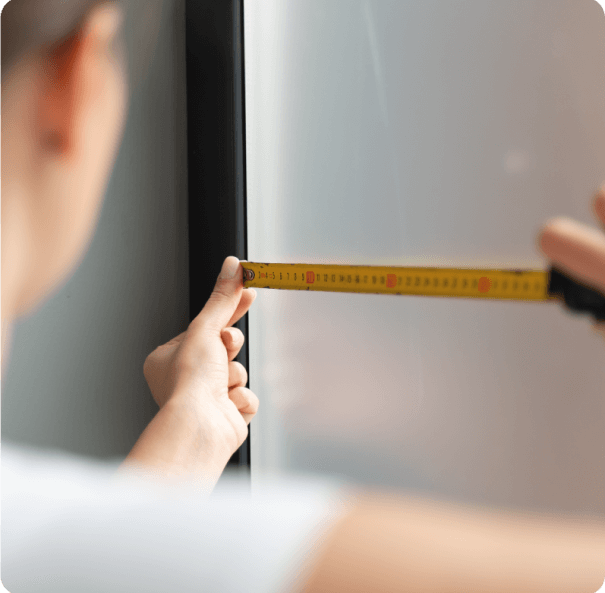 SNJ worker, measuring a window in Newark NJ