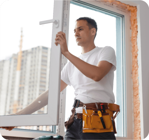 SNJ worker, installing a window in Newark NJ